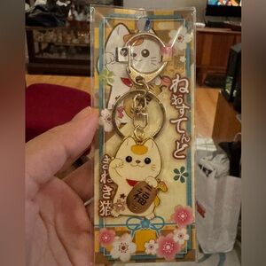 Cute Cat Keychain with Gold and White Accents